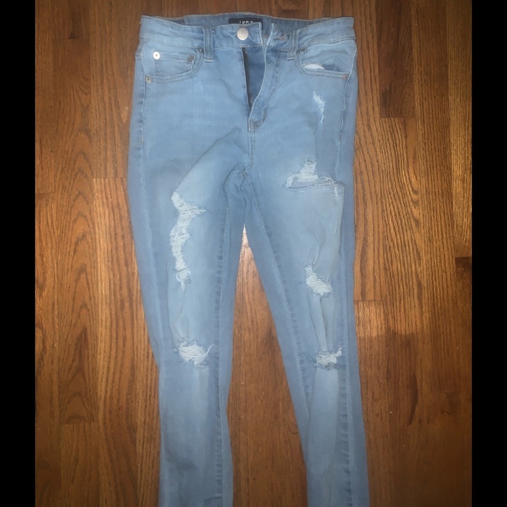light wash aeropostale jeans, with rips and size 7.